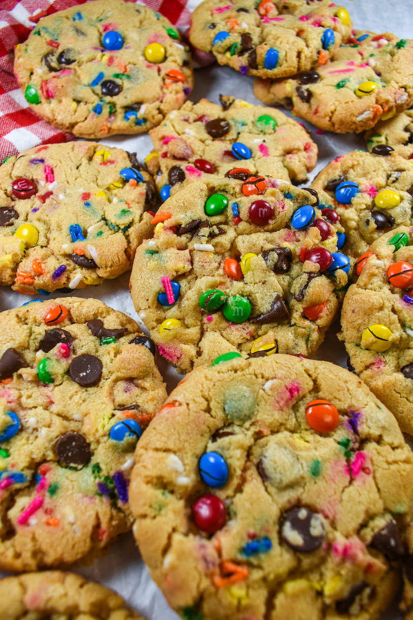 Bakery style M&M cookies with rainbow sprinkles and chocolate chips