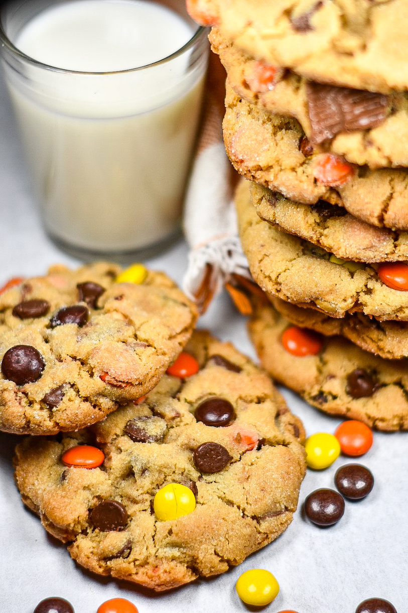 stack of peanut butter cookies and glass of milk