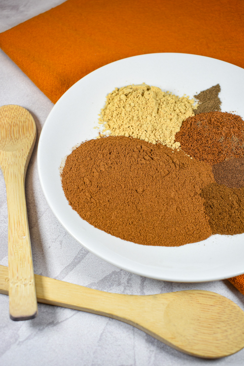 Homemade pumpkin spice recipe ingredients on a white plate