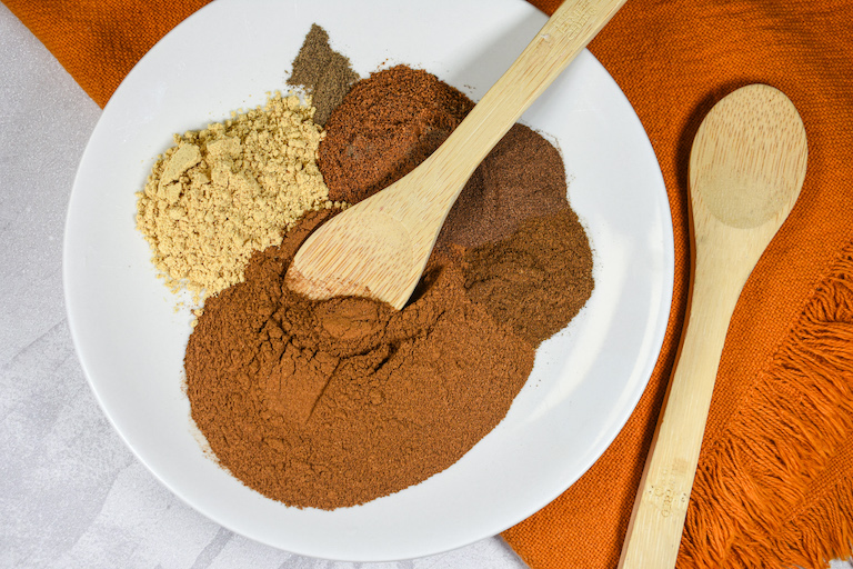 Pumpkin spice blend ingredients on a plate