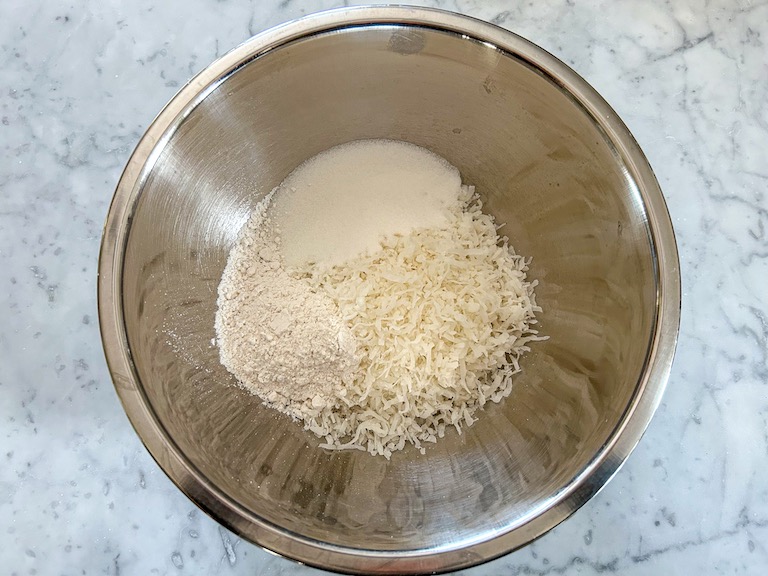 Coconut macaroon recipe ingredients in a bowl