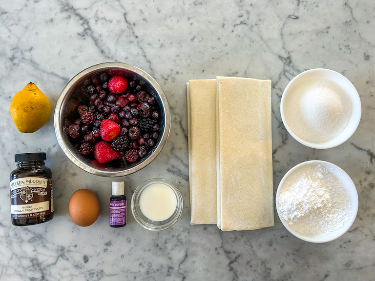 Hand pie ingredients arranged on a marble surface