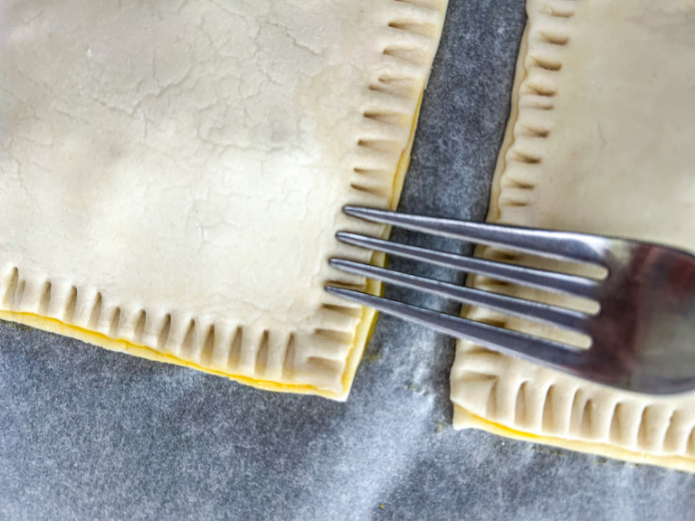 Fork crimping a hand pie