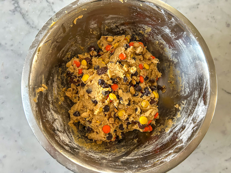 Reese's cookie dough in a metal bowl