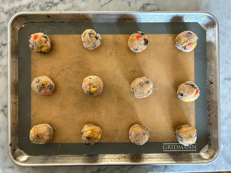 Balls of peanut butter cup cookie dough on a tray