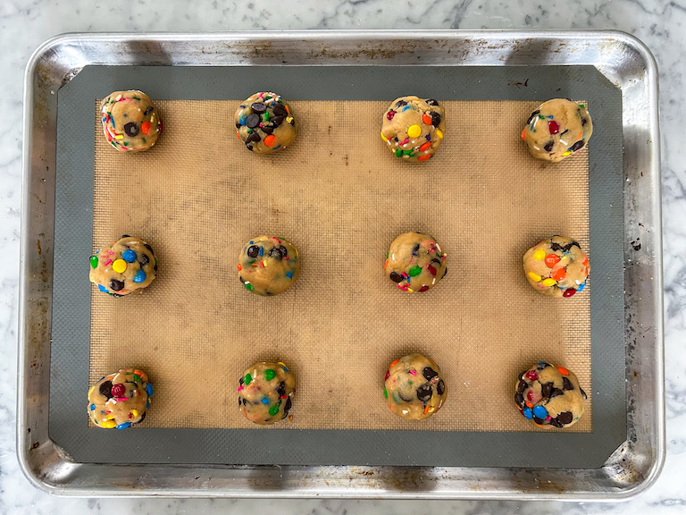 Balls of cookie dough on a tray