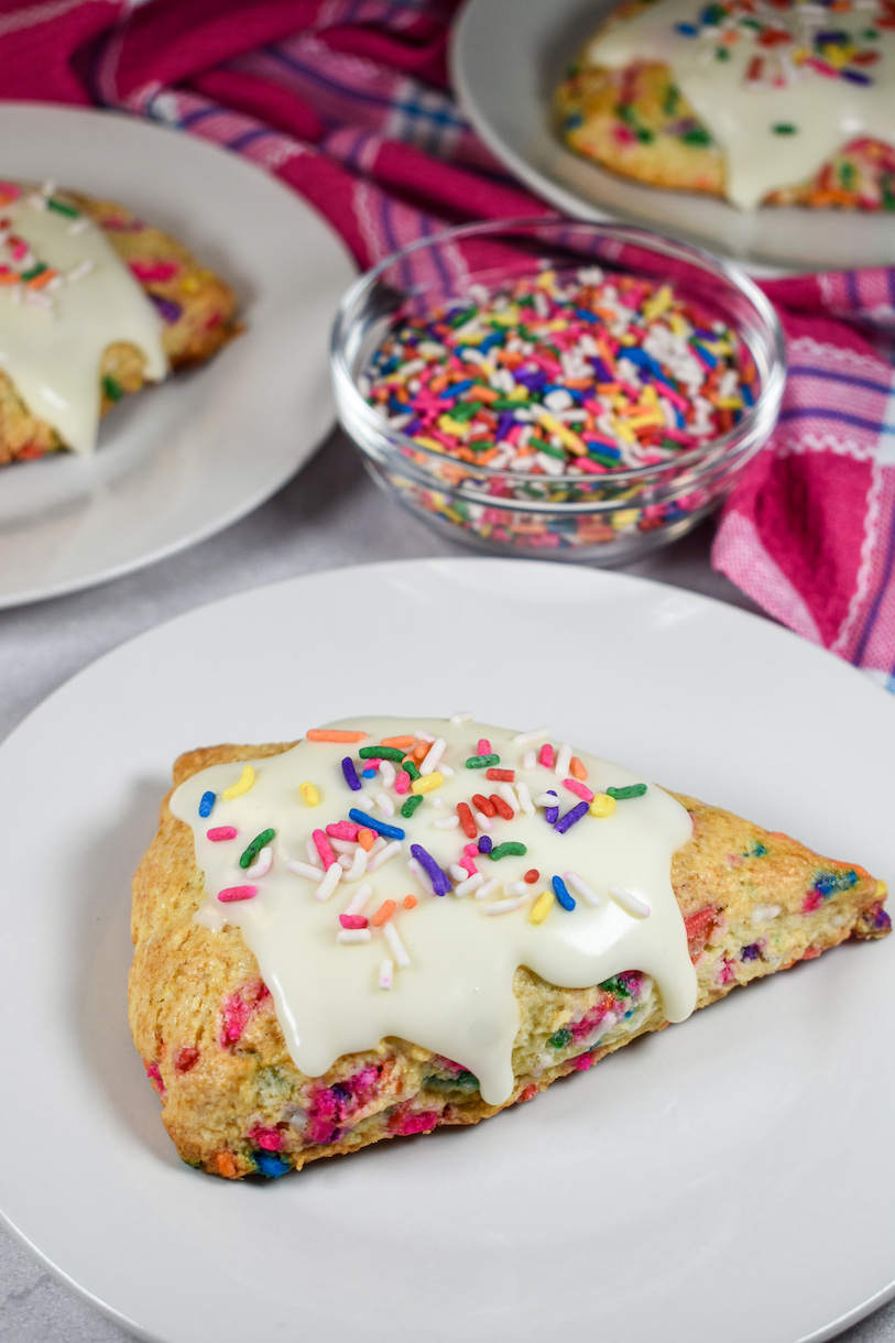 a funfetti scone on a white plate