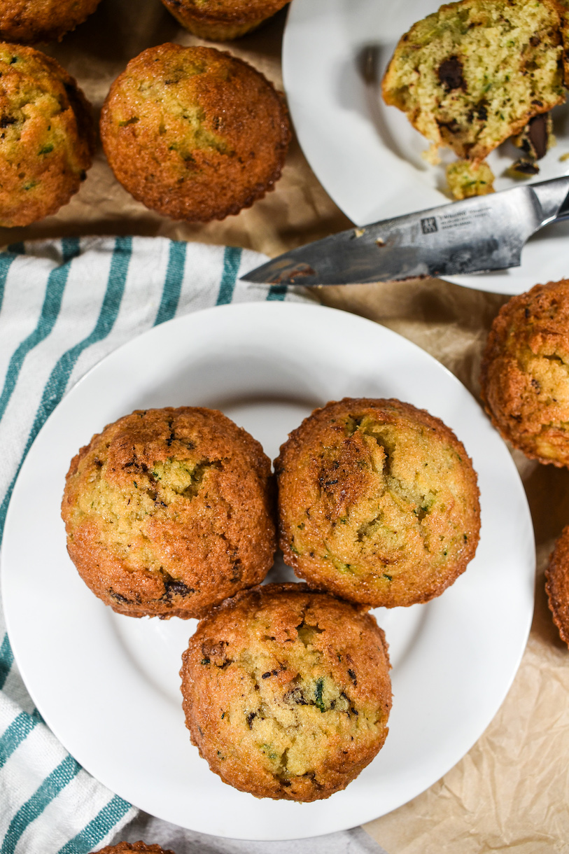 zucchini muffins on a white plate