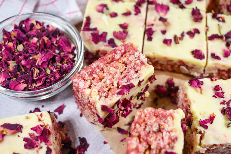 Raspberry rice krispie treats and a bowl of rose petals