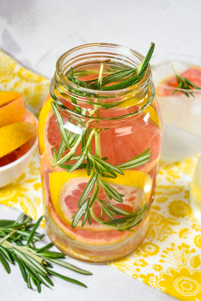 A mason jar filled with grapefruit infused water