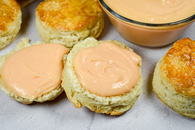Grapefruit curd spread on a homemade scone