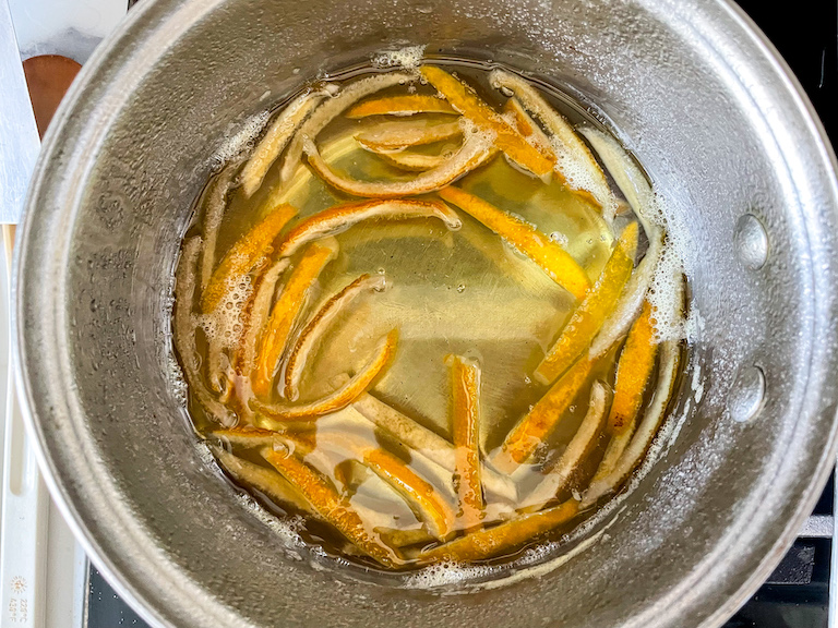 Candied lemon peels in sugar syrup