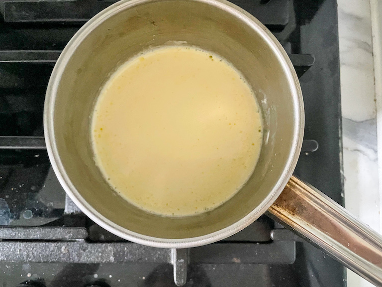 Small saucepan of cream on the stovetop