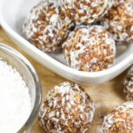 Coconut date balls in a ceramic dish