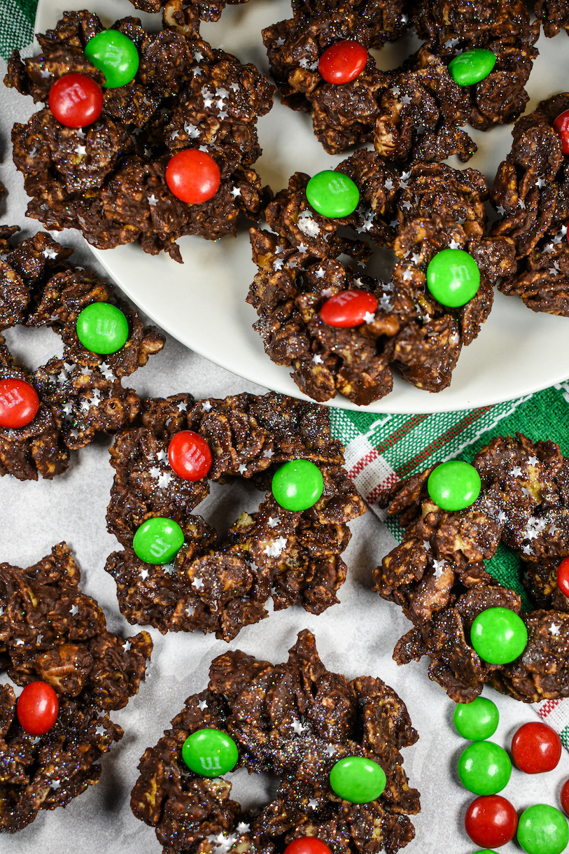 cornflake christmas wreaths arranged on a white plate