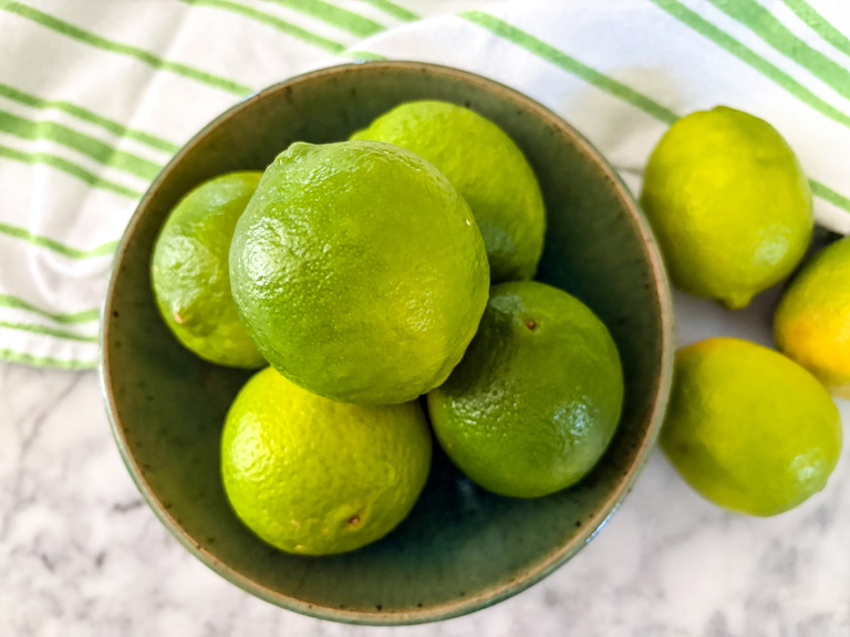 a bowl of limes