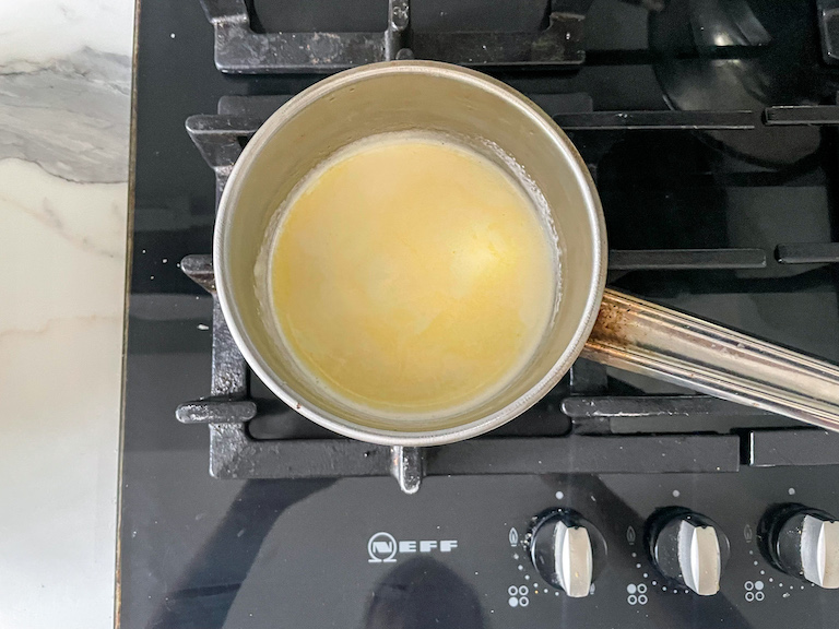 cream in a small pan on the stovetop