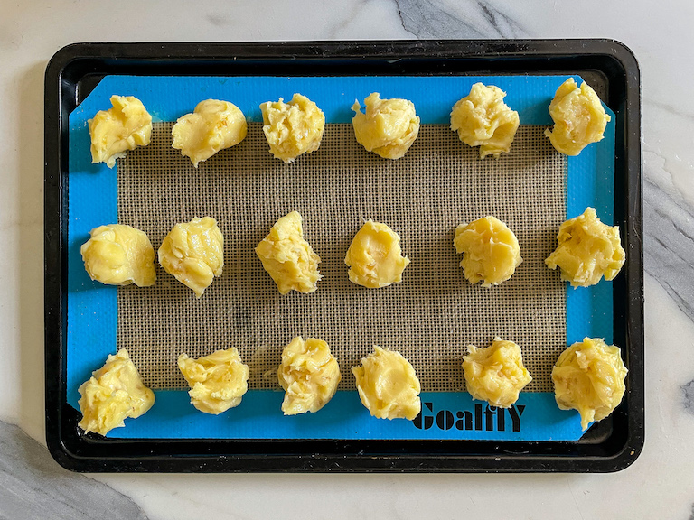 Dollops of ginger ganache on a silicone mat