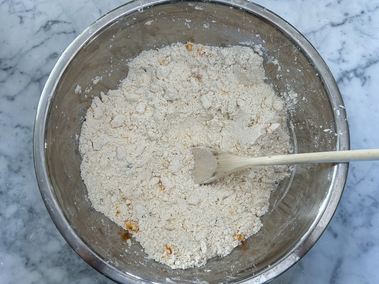 Dry scone ingredients in a metal bowl