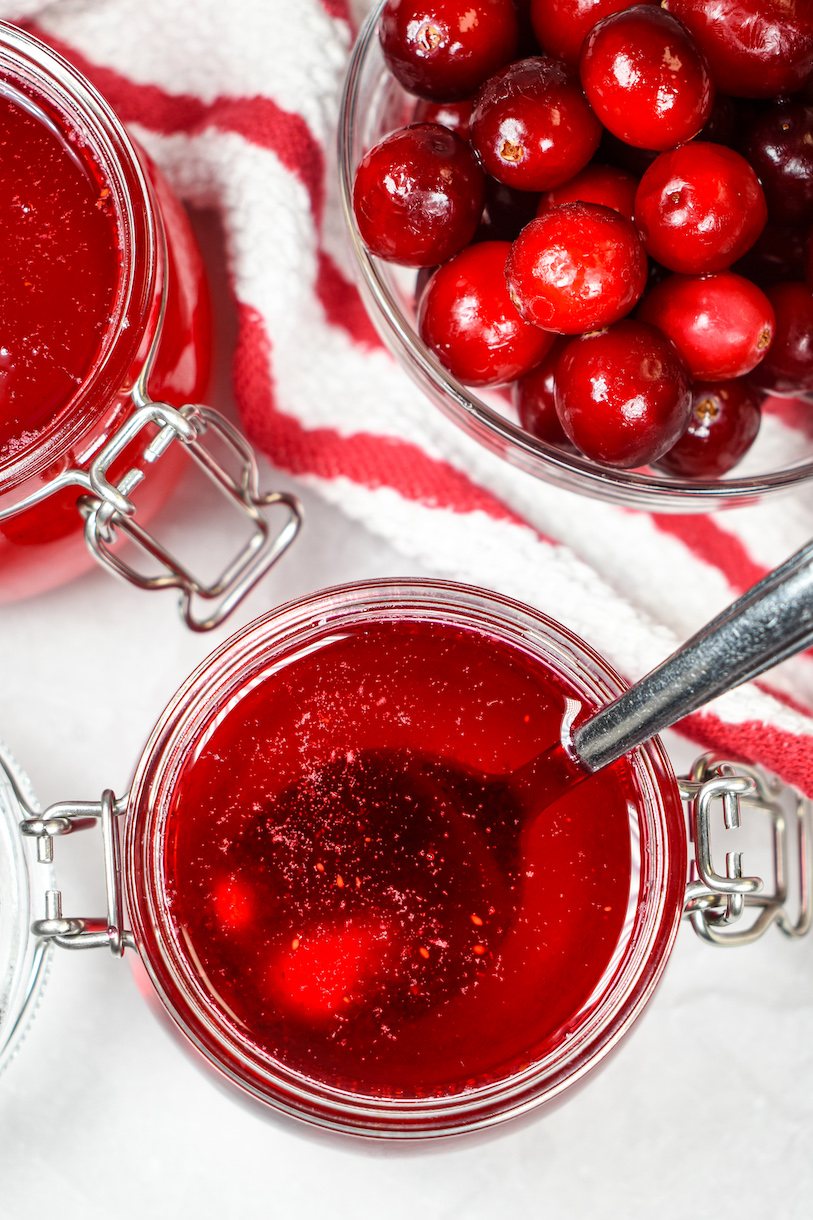 Looking down at a jar of cranberry syrup