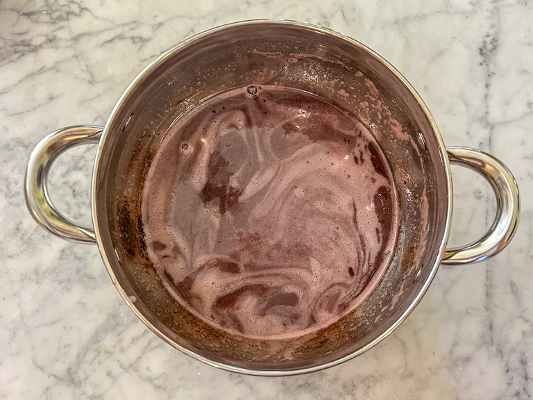 Cranberry candy mixture in a pan after cooking
