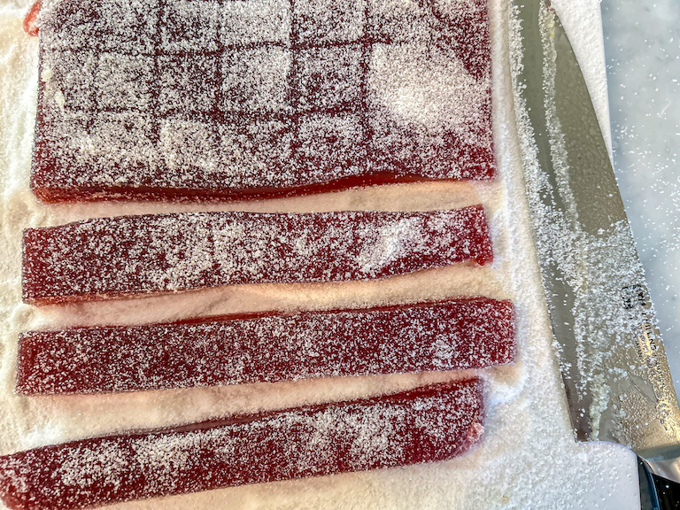 knife cutting jelly candy into squares