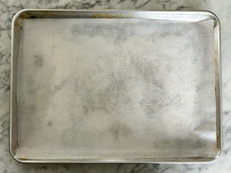 A metal tray lined with parchment