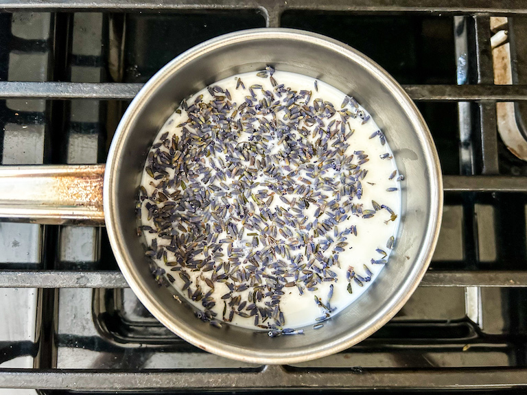Milk and dried lavender in a saucepan