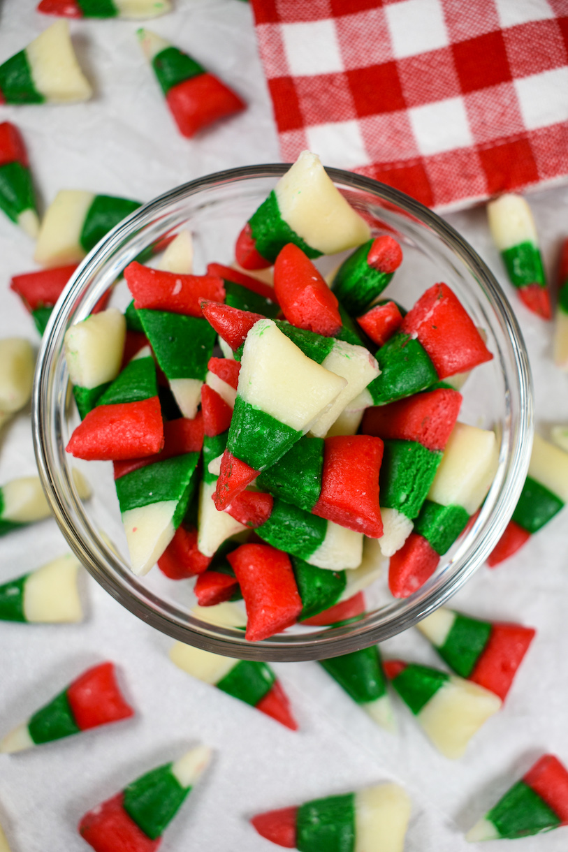 A bowl of red, white, and green candy corn for Christmas