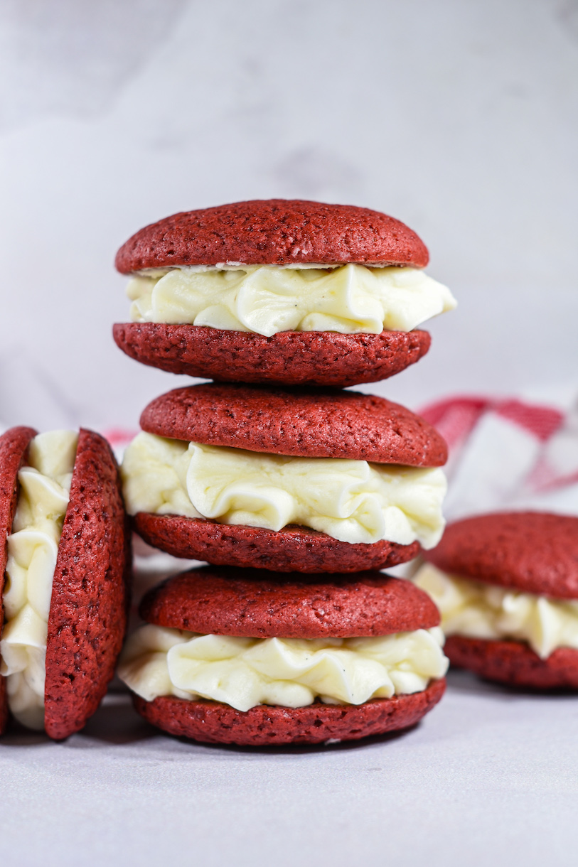 a stack of three red velvet whoopie pies