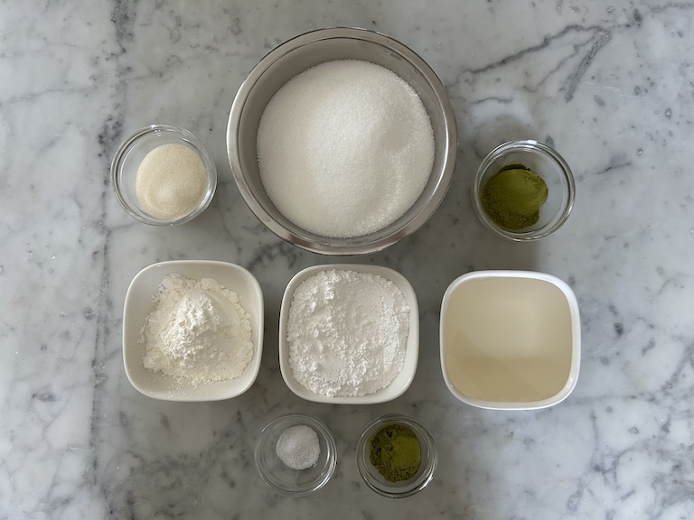 Matcha marshmallow recipe ingredients on a marble surface