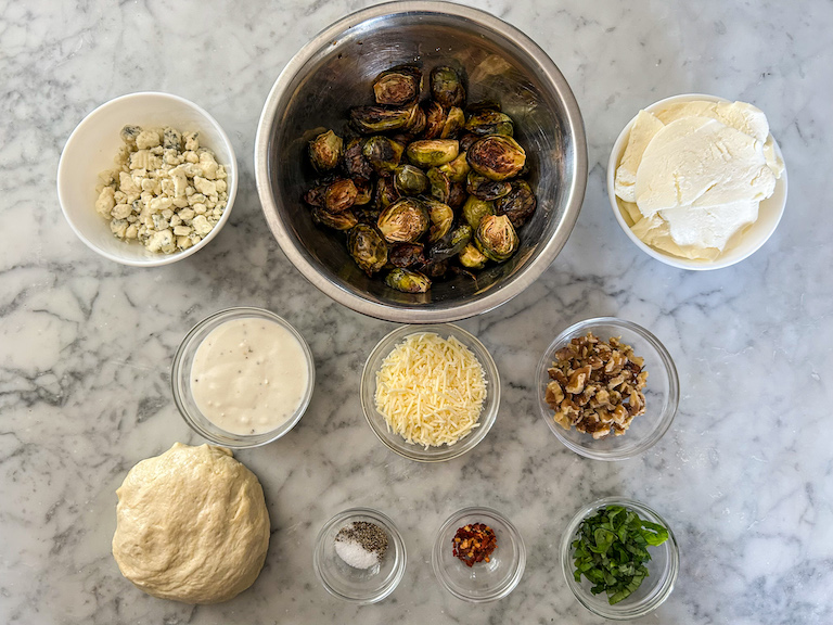 Recipe ingredients arranged on a marble countertop