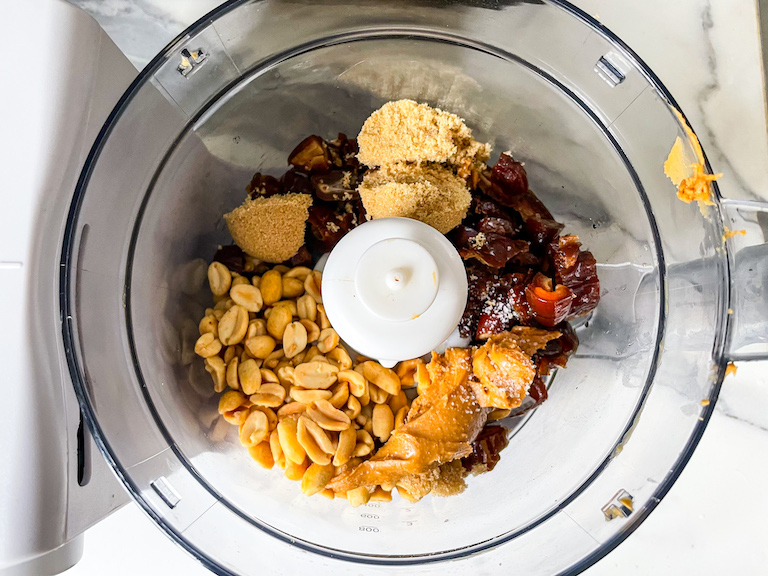 Cookie dough date ball recipe ingredients in a food processor