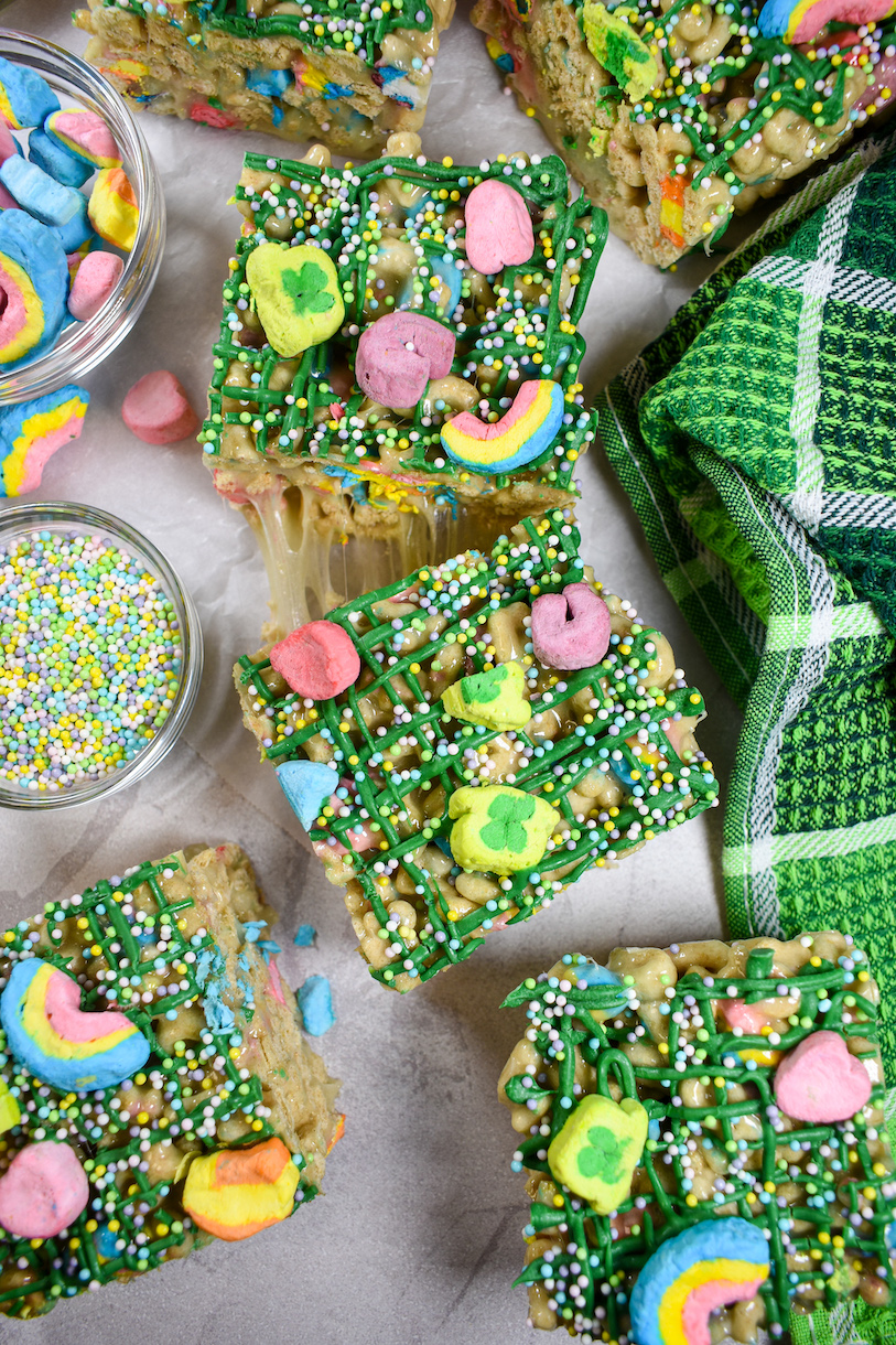 lucky charms treats on a white surface with a green plaid towel