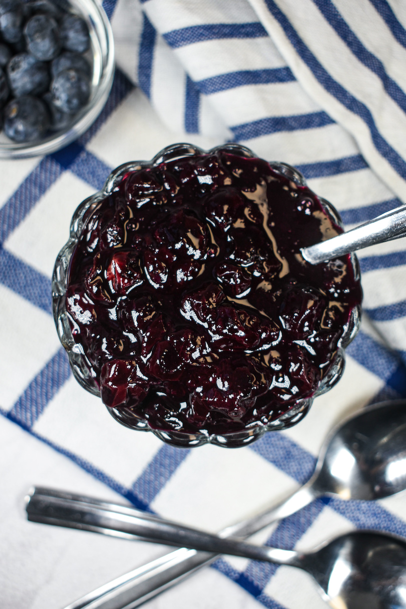 Looking down at a dish of homemade blueberry compote