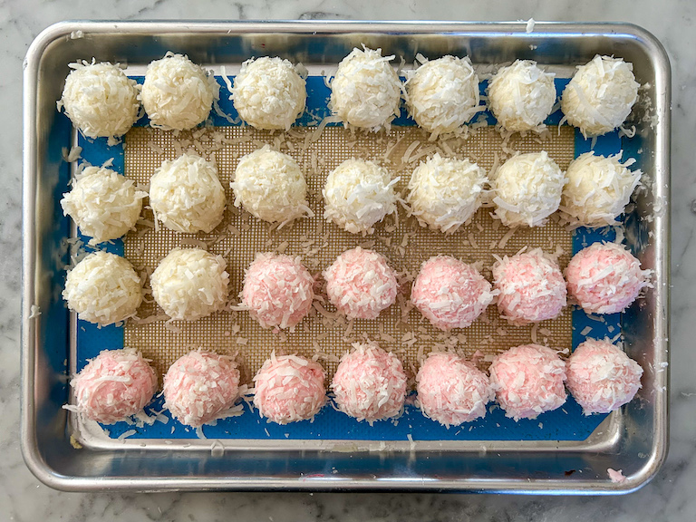 Coconut truffles arranged on a small tray