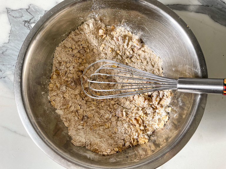 Dry ingredients in a bowl with a whisk