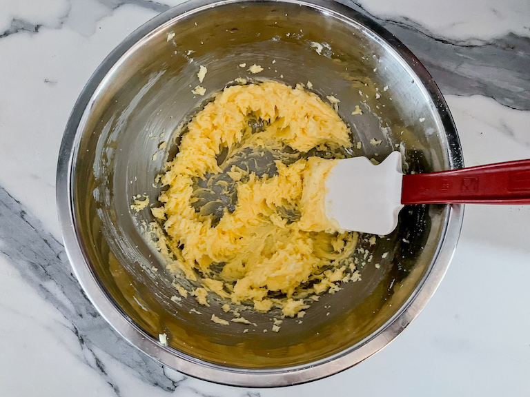 Whipped butter in a bowl with a spatula