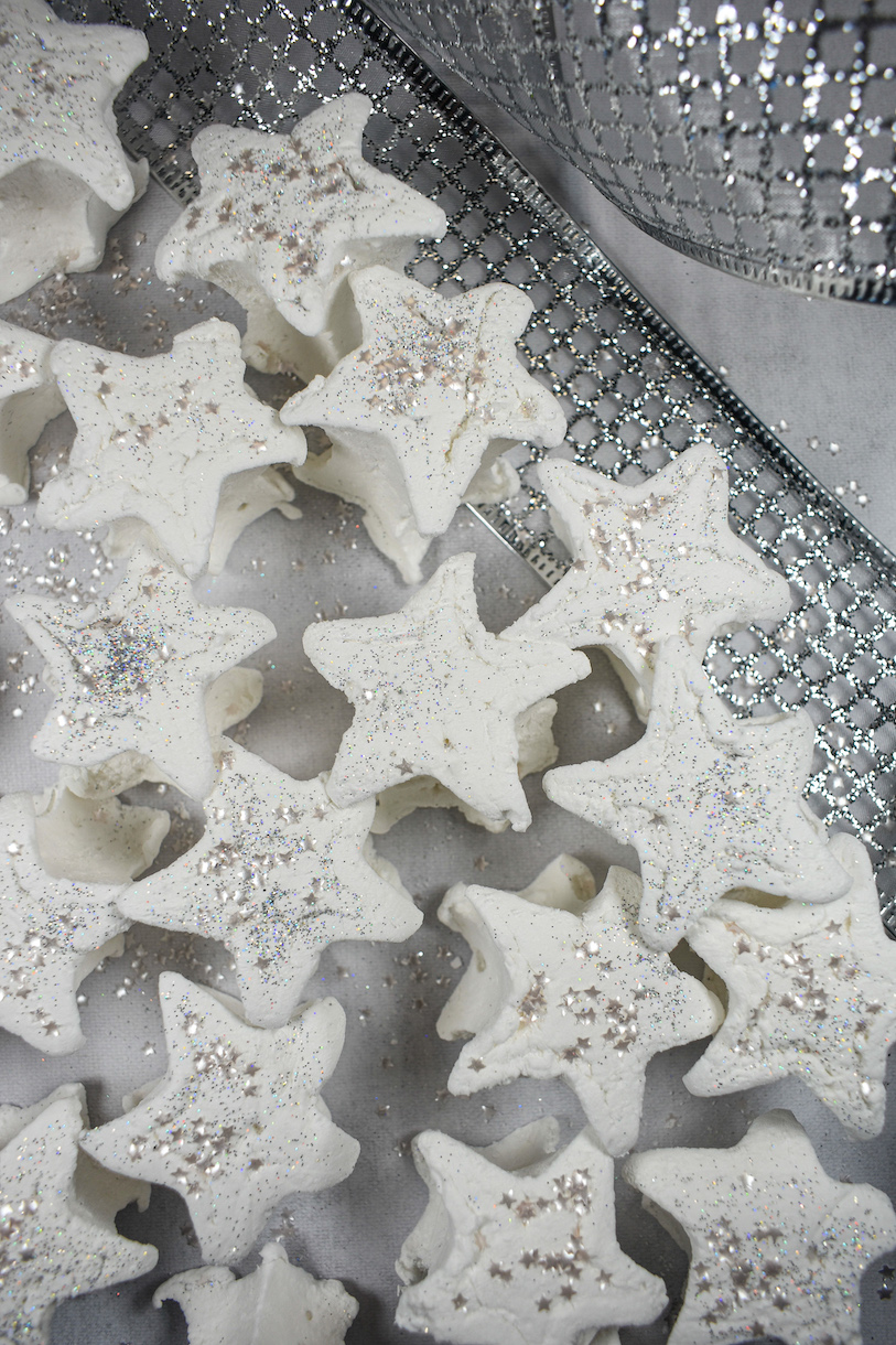 Star marshmallows on a white surface