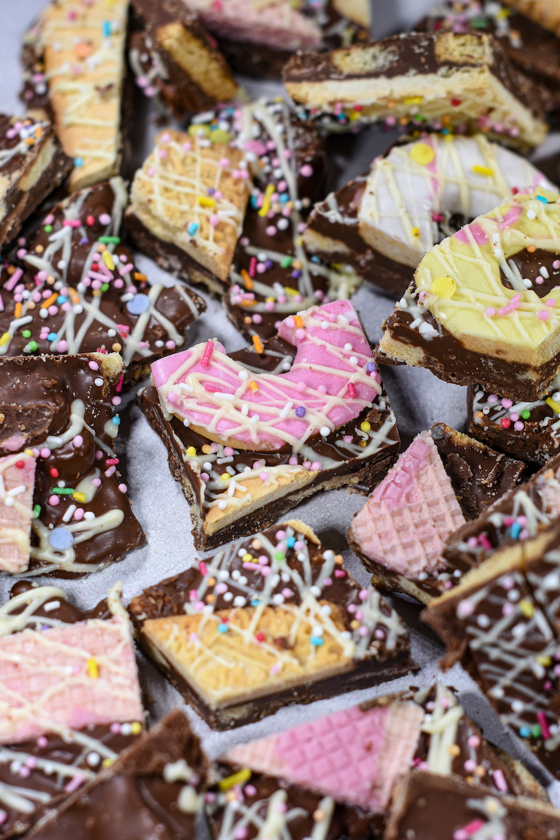 Biscuit bark arranged on a white surface