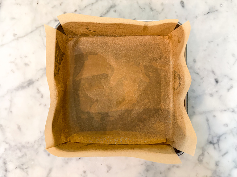 Square tin lined with parchment