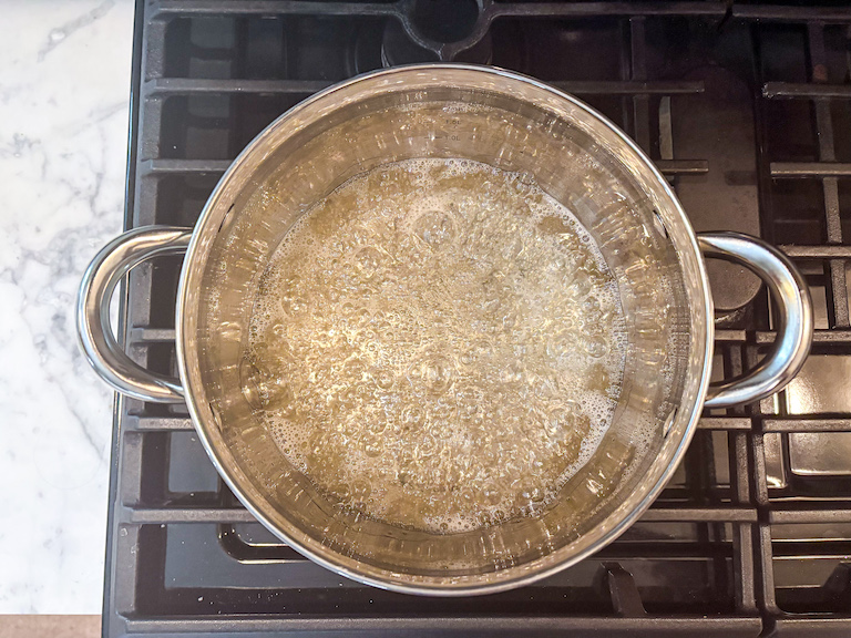 Sugar syrup in a pan on the stovetop