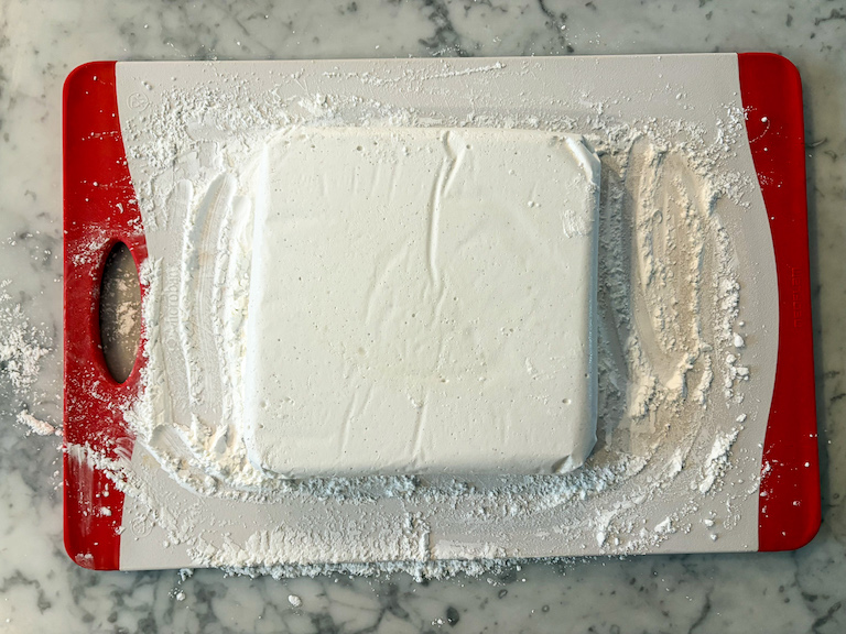 Marshmallow slab on a cutting board