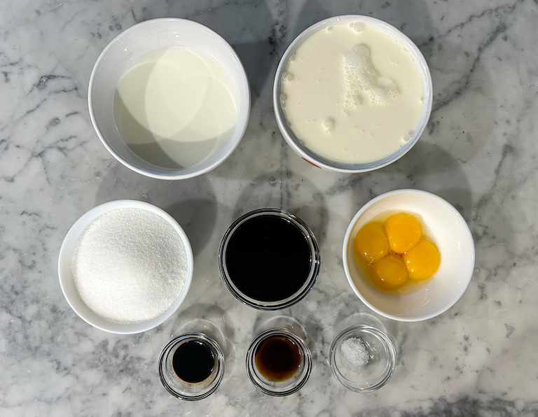 Coffee ice cream recipe ingredients on a marble surface