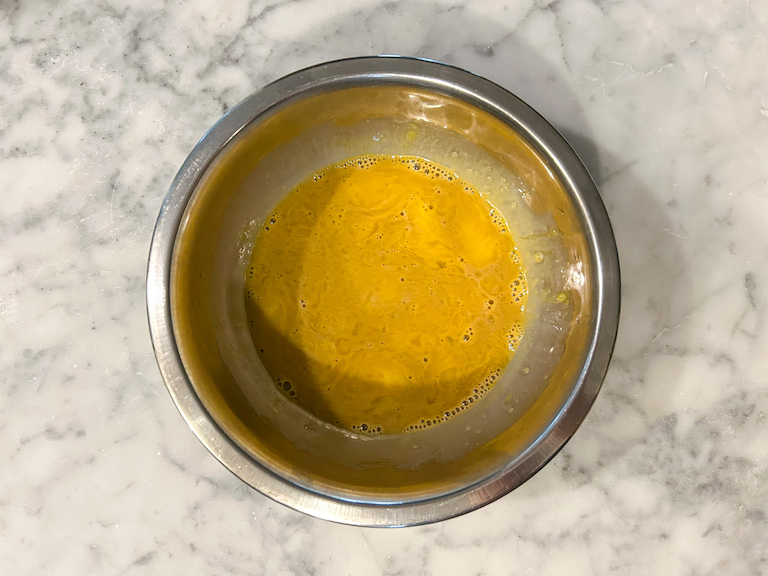 Tempering eggs into coffee ice cream base
