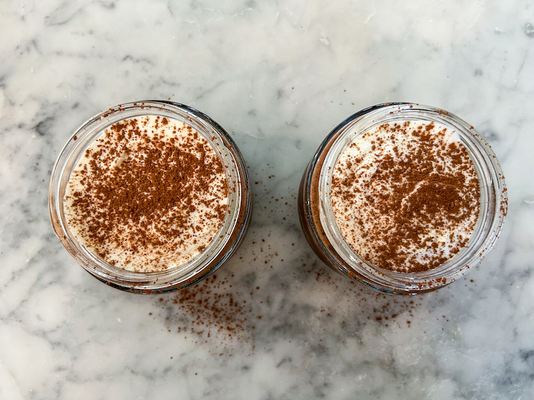 Tiramisu overnight oats dusted with cocoa powder