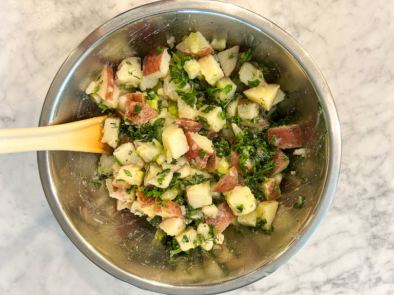Red potato salad in a bowl