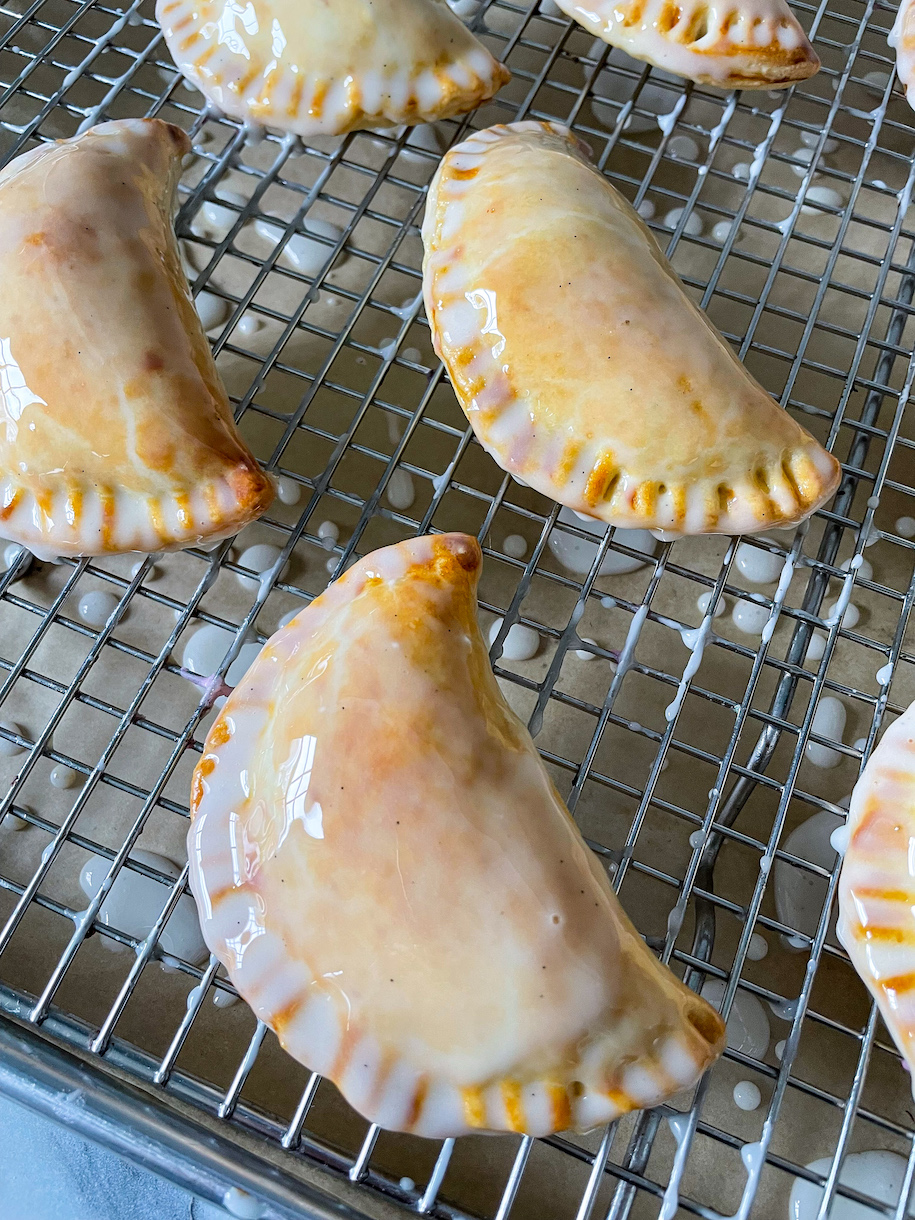 glazed hand pies on a wire rack