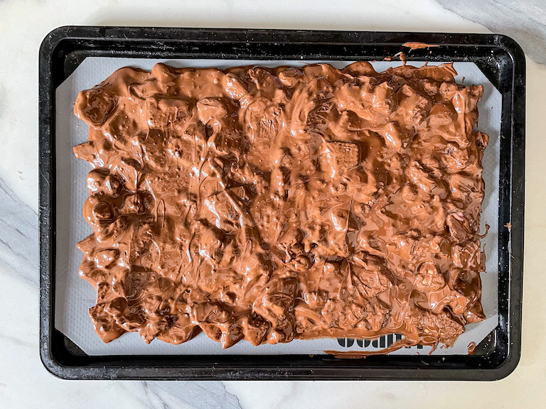 Melted chocolate spread on a small tray