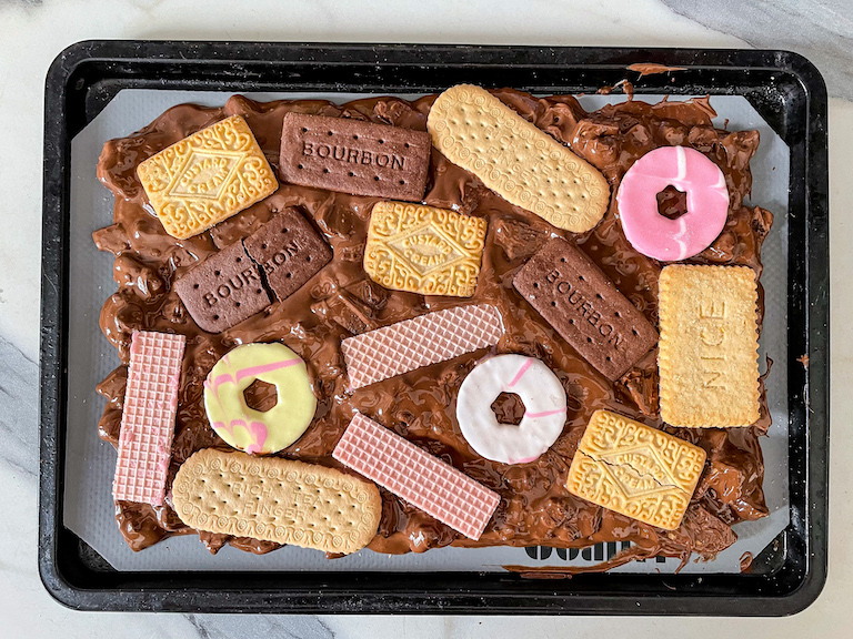 Melted chocolate decorated with British biscuits